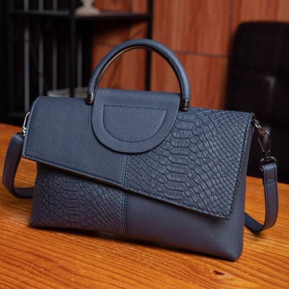 Luce vegan leather clutch